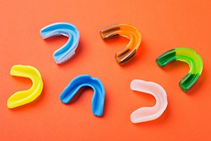 an assortment of colored mouthguards
