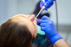 a patient receiving dental care while sedated