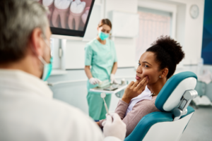 a patient visiting their dentist for dental pain